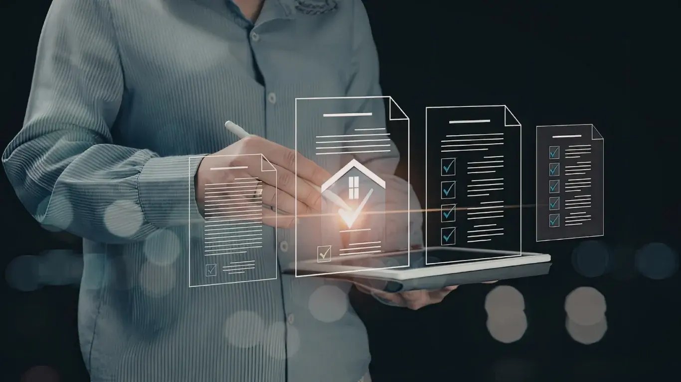 Usuario validando documentos digitales con firma electrónica en tablet mediante un software de gestión documental.